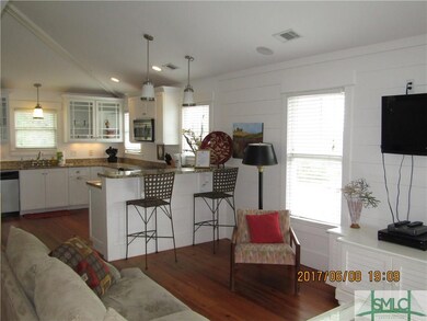 Large gourmet kitchen with stainless appliances, g