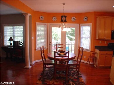 Kitchen - Eat-in kitchen overlooks the private rea