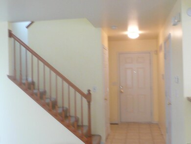 Front door, half bath, then door to basement then 