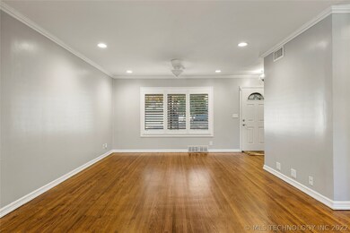 Plantation Shutters in living/dining room.