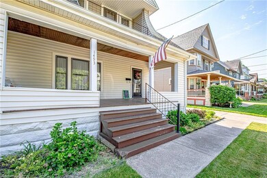 A large front porch greets you as you arrive