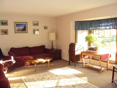 Spacious Living Room with Large Bay Window.