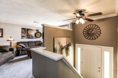 Upper Foyer leads to Living room....