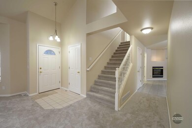 Living room with vaulted ceilings