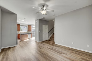 Unfurnished living room featuring light wood-styl