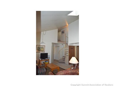 Living Room. Lofted space feels HUGE. Light & brig