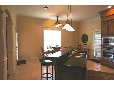 Kitchen. Breakfast area opens to covered patio & i