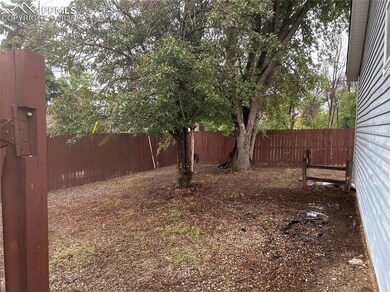 View of fenced backyard