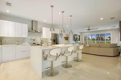 Kitchen through to Living Room