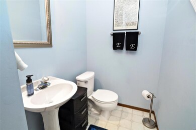 Half bath main level front of home.