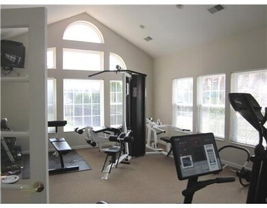 Club house fitness center with TV for leisure use