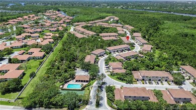Community with pool, clubhouse and entry gate.