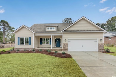 View of front of property featuring brick siding, 