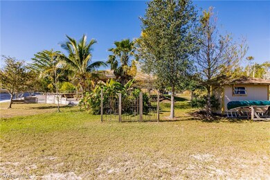 715 Kalamar Dr, Lehigh Acres, FL 33974 - photo 5
