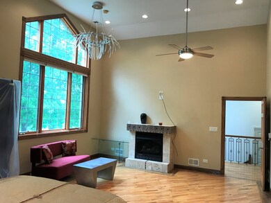 Master Bedroom sitting area with fireplace.