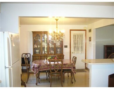 Dining Room. Outside door is from the garage, brea