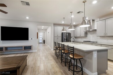 Kitchen with appliances with stainless steel finis
