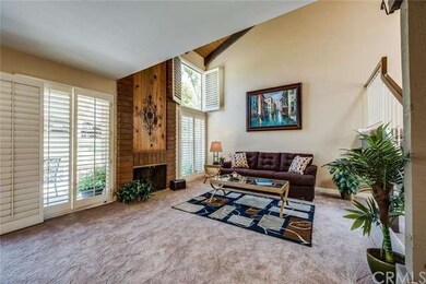 The incredibly spacious living room has cathedral 