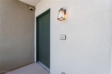 Doorway to property featuring stucco siding