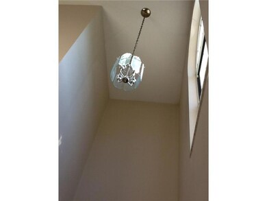 Entry/Foyer. View of the 2 story foyer with a lovely chandelier and large window to make this entry bright and cheerful!