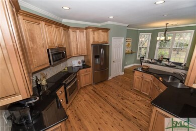 Well appointed real wood cabinety wtih 42