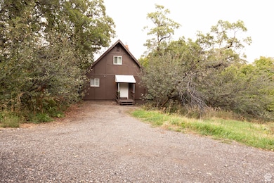 Chalet / cabin featuring a chimney