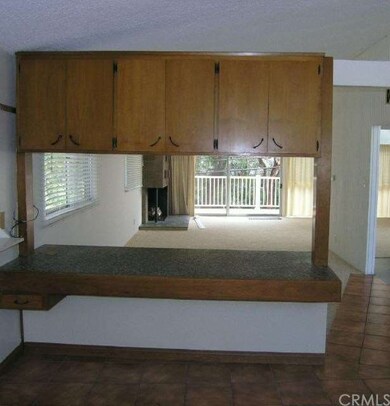 Breakfast bar looking into dining/living room