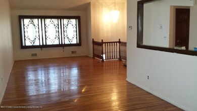 living room with vaulted ceilings