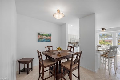 Tiled dining area with ceiling fan