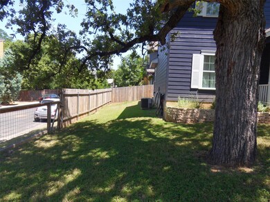 View of fenced backyard