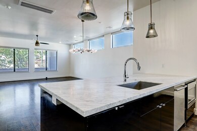 The Kitchen, the main hub of the home, shows off t