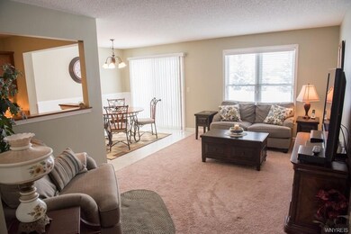 OPEN AIRY FEEL WITH OPEN UPPER WALL IN KITCHEN OVE