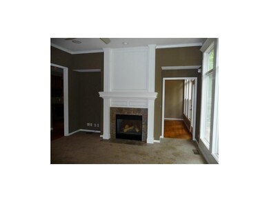 Fireplace in the formal living room is see-thru