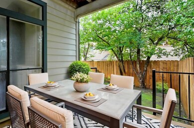 View of patio with outdoor dining space