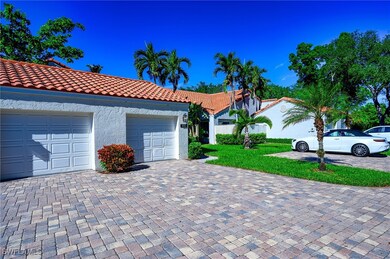 View of front facade featuring a garage and a fron