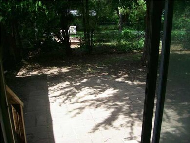Back patio through slider in back room.