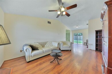 Family-sized Living Room with laminate floors and 
