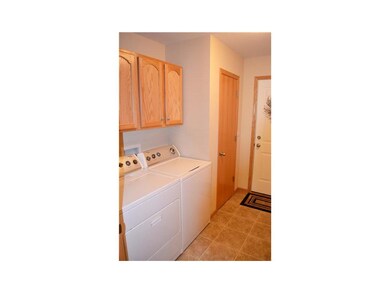Laundry Area. Laundry room with tile floors and ca