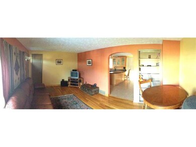 Living Room. THE LIVING ROOM HAS A REFINISHED HARD