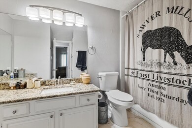 Full bathroom featuring toilet, shower / bath comb