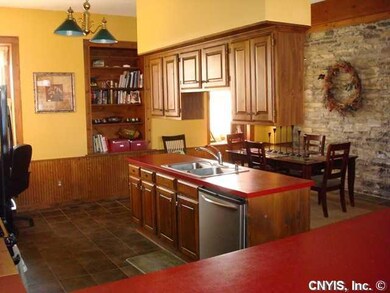 Kitchen. Center island in this country kitchen tha