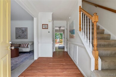 Newer laminate flooring in foyer.