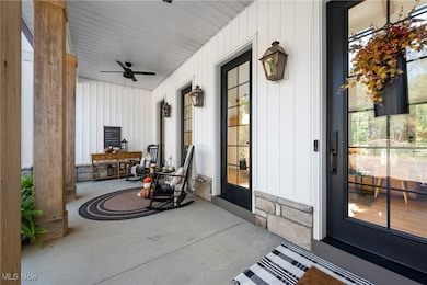 Covered porch with ceiling fan