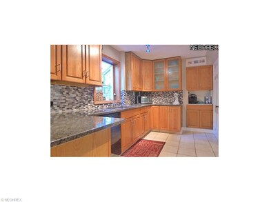 Black granite counter tops with black and stainles