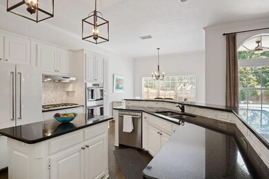 Updated kitchen with contrasting whites cabinets a