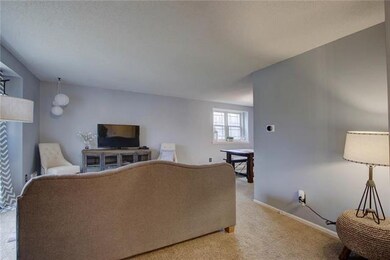 Light and bright family room is perfect for entert