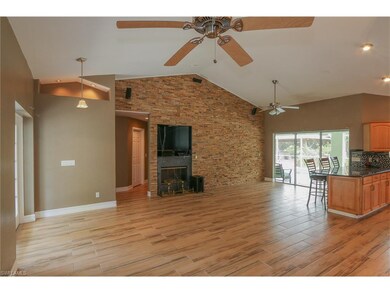 Living Room with fireplace, surround stereo.