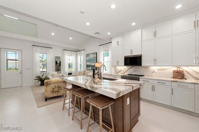 Kitchen featuring a sink, recessed lighting, backs