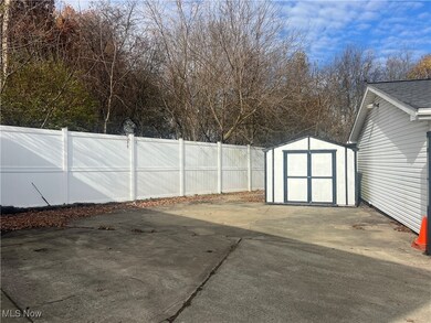 Storage shed with electric makes a great workshop area or lawn equipment storage area.