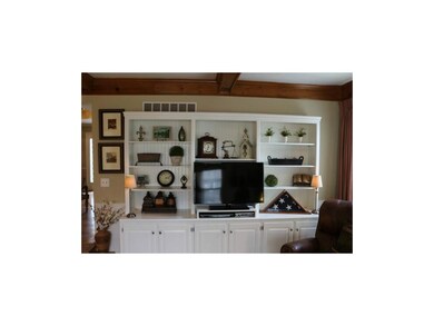 Built in cabinet in family room wired for all of y